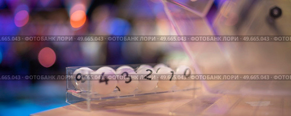 white balls with numbers for the game of lottery. Стоковое фото, агентство Ingram Publishing / Фотобанк Лори