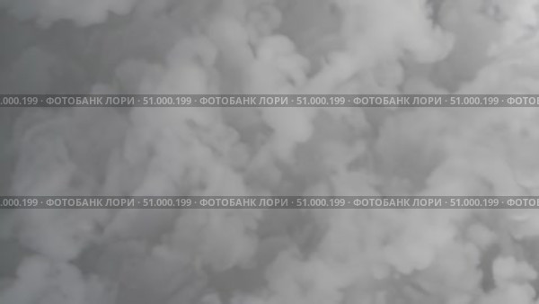 White smoke billowing across frame, generating abstract gray white backdrop, ideal for digital artwork and graphic design compositions. Стоковое AI-видео, аниматор Данил Руденко / Фотобанк Лори