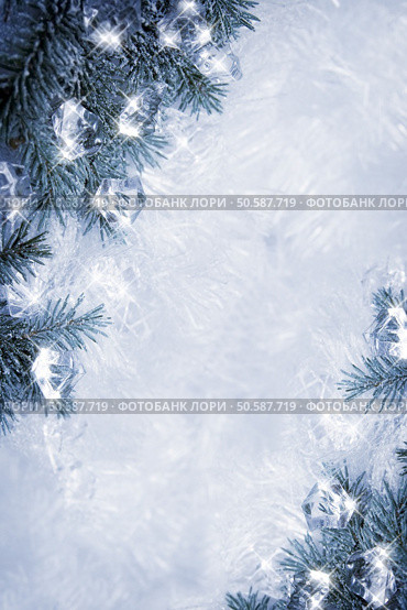 Winter backround with spruce branches and cubes of ice. Стоковое фото, агентство Ingram Publishing / Фотобанк Лори