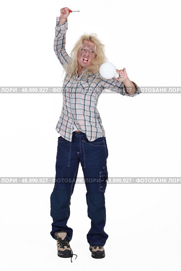 Woman getting an electric shock. Стоковое фото, агентство Ingram Publishing / Фотобанк Лори