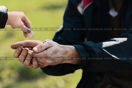 Woman giving money to poor homeless man outdoors. Стоковое фото, фотограф Pixel_shot / Фотобанк Лори