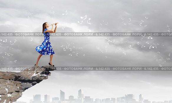 Woman playing fife. Стоковое фото, фотограф Sergey Nivens / Фотобанк Лори