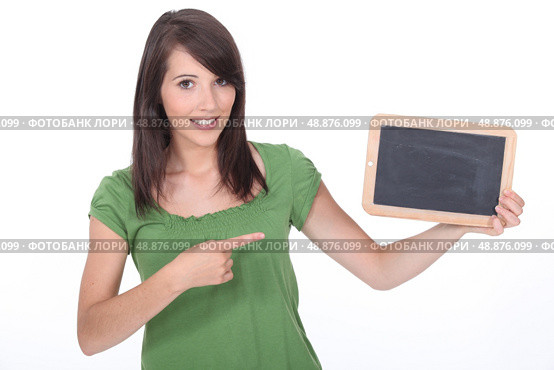 Woman pointing a slate. Стоковое фото, агентство Ingram Publishing / Фотобанк Лори