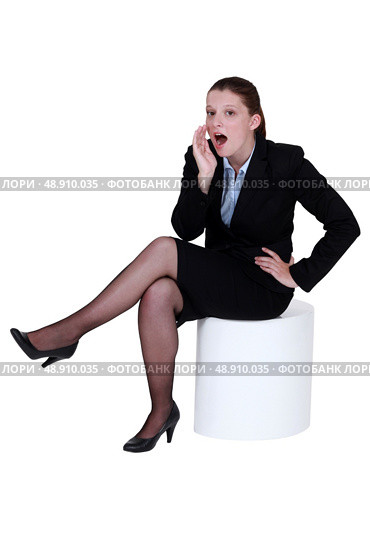 Woman telling a secret. Стоковое фото, агентство Ingram Publishing / Фотобанк Лори