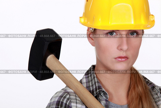 Woman with a sledgehammer. Стоковое фото, агентство Ingram Publishing / Фотобанк Лори