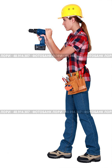Woman with drill. Стоковое фото, агентство Ingram Publishing / Фотобанк Лори