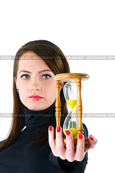 Woman with hourglass isolated on the white. Стоковое фото, агентство Ingram Publishing / Фотобанк Лори