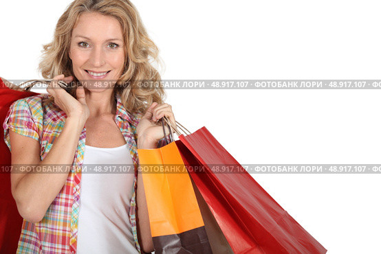 Woman with numerous shopping bags. Стоковое фото, агентство Ingram Publishing / Фотобанк Лори