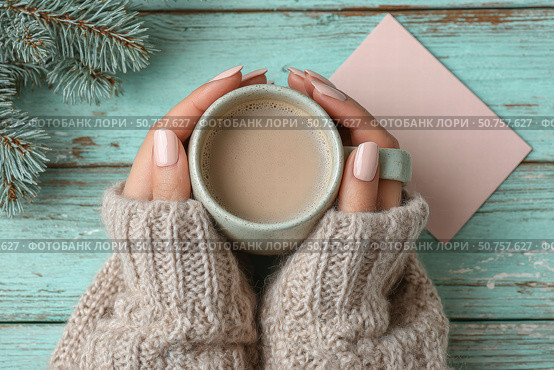 Woman's hands holding a mug of warm coffee. Стоковое AI-изображение, AI-художник Boris Vasilenko / Фотобанк Лори