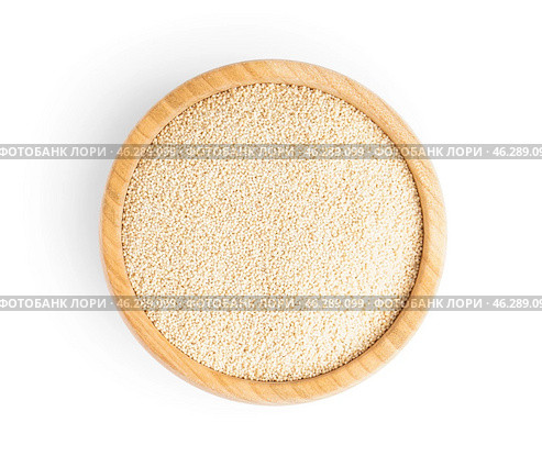 Wooden bowl of amaranth seeds isolated on white background. Стоковое фото, фотограф Pixel_shot / Фотобанк Лори