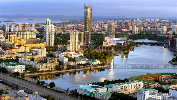 Yekaterinburg, Russia, aerial view of the city with the Iset tower and the river with embankment. Стоковое фото, фотограф David Kashakhi / Фотобанк Лори