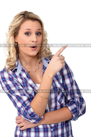 young blonde woman showing something. Стоковое фото, агентство Ingram Publishing / Фотобанк Лори