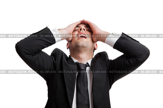 Young businessman worried with a bad business, isolated over a white background . Стоковое фото, агентство Ingram Publishing / Фотобанк Лори