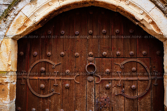 Zamora detail of old aged wood door in Spain by the via de la Plata way. Стоковое фото, агентство Ingram Publishing / Фотобанк Лори