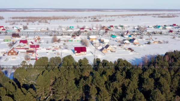 Западная Сибирь, Ханты-Мансийский автономный округ, село Тундрино. Вид с воздуха. Western Siberia, Khanty-Mansi Autonomous Okrug, Tundrino village. Aerial view. (2022 год). Стоковое видео, видеограф Евгений Романов / Фотобанк Лори