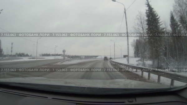 Заснеженная федеральная трасса Москва-Петербург в Тверской области, новый строящийся платный участок дороги, вид из автомобиля, таймлапс. Стоковое видео, видеограф Кекяляйнен Андрей / Фотобанк Лори