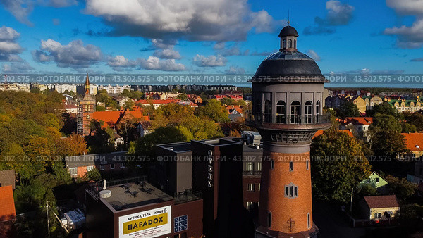 Zelenogradsk, Russia - October 9, 2022: water tower Cranz top ariel view. Редакционное фото, фотограф Наталья Симакова / Фотобанк Лори